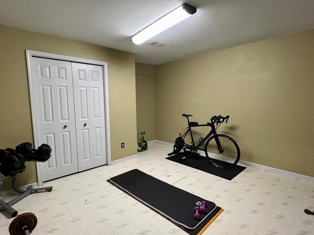 9220 Cotters Ridge Rd, Richland, MI 49083 - workout room with tile patterned floors and baseboards