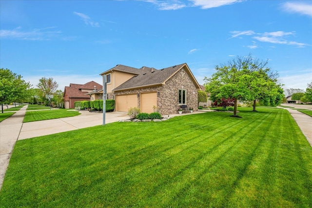 view of front of home featuring a garage, stone siding, a front yard, and concrete driveway