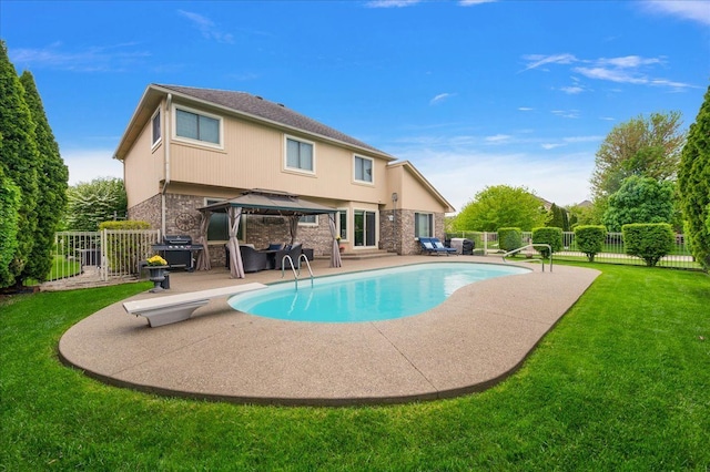view of swimming pool with a gazebo, a patio area, a grill, and a diving board
