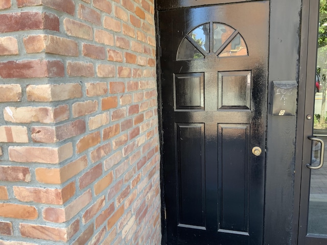 103 W Michigan Ave, Clinton, MI 49236 - entrance to property with brick siding