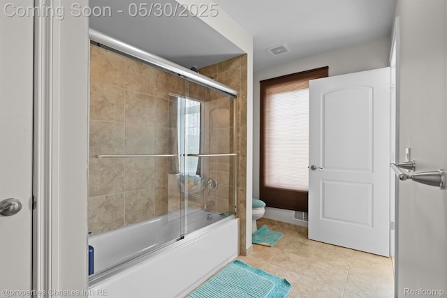 24516 Cavendish Ave E, Novi, MI 48375 - full bath featuring toilet, shower / bath combination with glass door, and tile patterned flooring