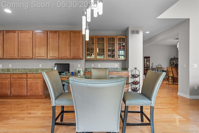 24516 Cavendish Ave E, Novi, MI 48375 - dining room with recessed lighting, light wood-type flooring, and baseboards