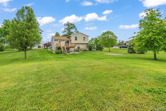 367 116th Ave, Martin, MI 49070 - view of green lawn featuring stairs and a deck