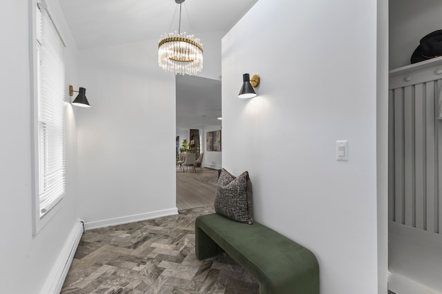 22432 Maple St, Saint Clair Shores, MI 48081 - hallway featuring a baseboard radiator, a chandelier, healthy amount of natural light, and baseboards