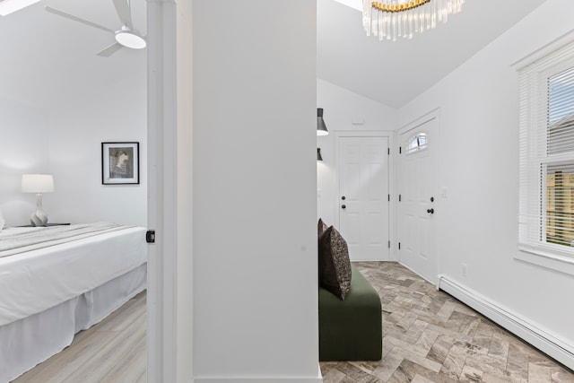 22432 Maple St, Saint Clair Shores, MI 48081 - corridor with a baseboard radiator, vaulted ceiling, a chandelier, plenty of natural light, and baseboards
