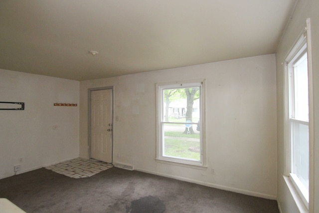 4521 Columbus St, Wayne, MI 48184 - carpeted empty room featuring baseboards