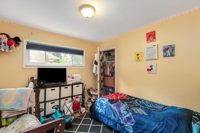 carpeted bedroom featuring a closet