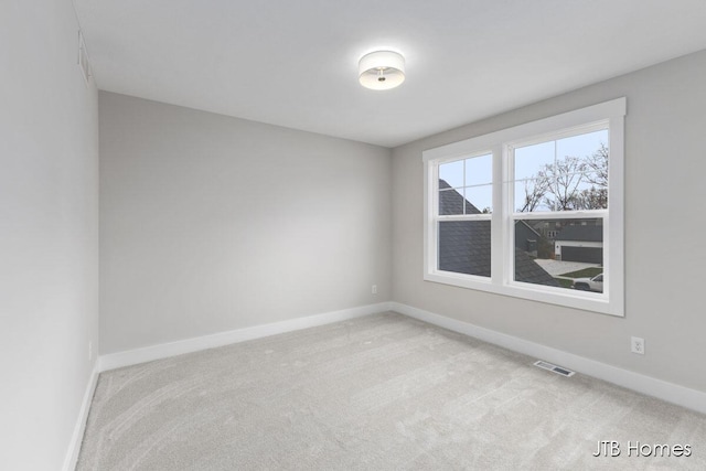 1404 Kimber Dr Unit 124, Lowell, MI 49331 - empty room featuring carpet flooring