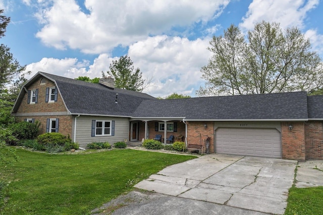 8277 Mccandlish Rd, Grand Blanc, MI 48439 - dutch colonial featuring roof with shingles, covered porch, driveway, a garage, and brick siding