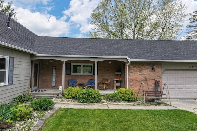 8277 Mccandlish Rd, Grand Blanc, MI 48439 - property entrance with an attached garage, brick siding, roof with shingles, and a porch