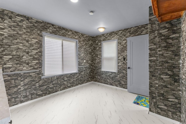 13734 Backus St, Southgate, MI 48195 - empty room featuring marble look tile flooring