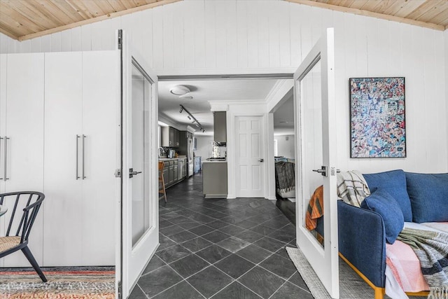 47130 Blue Star Hwy, Covert, MI 49043 - living room with french doors, wooden ceiling, and wood walls