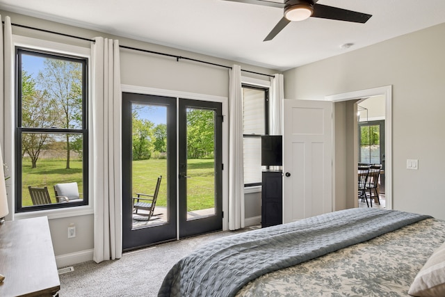 bedroom with access to outside, carpet flooring, baseboards, and a ceiling fan