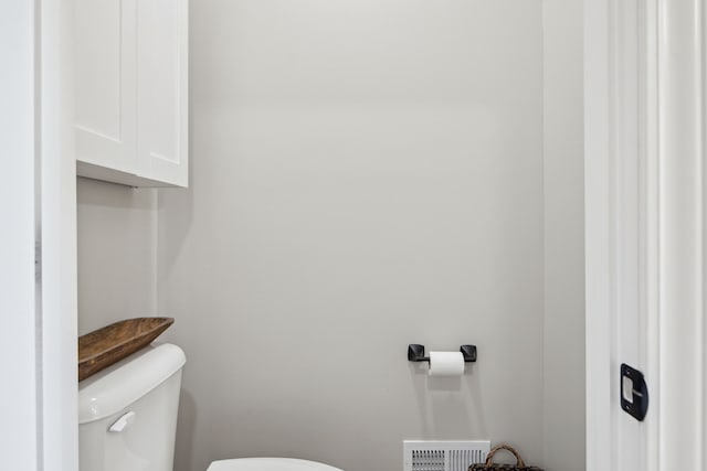 half bathroom with toilet