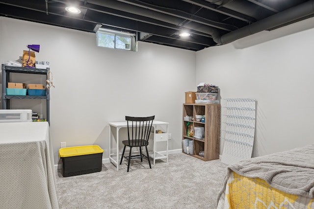 carpeted bedroom featuring baseboards