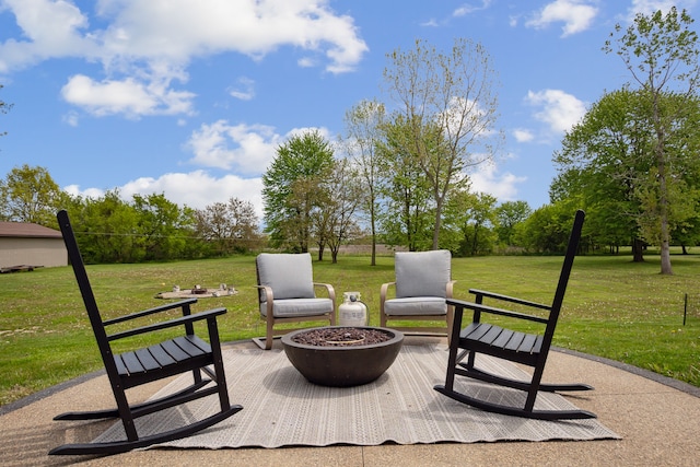 view of patio / terrace featuring a fire pit