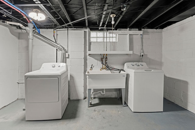 laundry area with washing machine and dryer