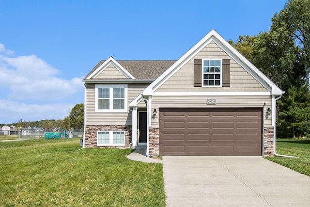 view of front of home featuring stone siding, driveway, a front lawn, and a garage