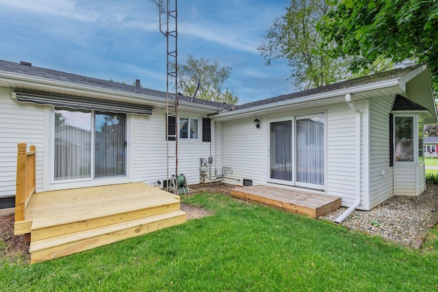 6934 Colonial Dr, Tecumseh, MI 49286 - back of house featuring a deck and a lawn