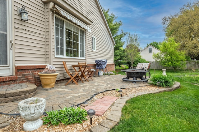 view of patio featuring a fire pit