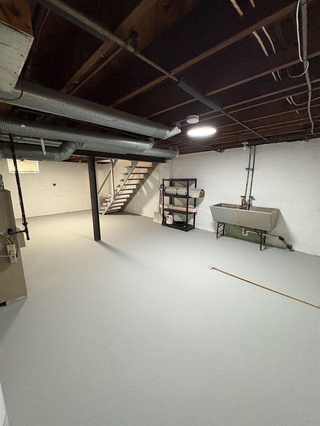 basement featuring a sink