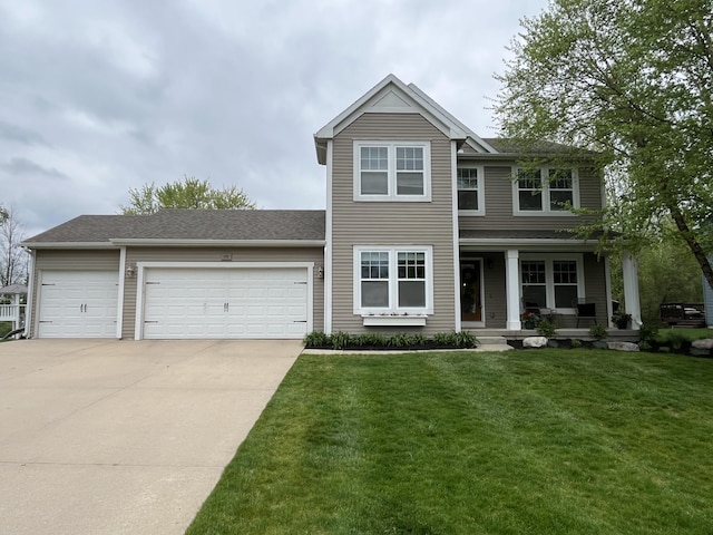 traditional-style home featuring concrete driveway, a garage, covered porch, and a front yard