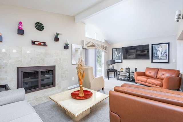 12848 E 14 Mile Rd, Warren, MI 48088 - living area with beamed ceiling, a tile fireplace, and high vaulted ceiling
