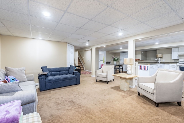 12848 E 14 Mile Rd, Warren, MI 48088 - living area with light colored carpet, stairway, and recessed lighting
