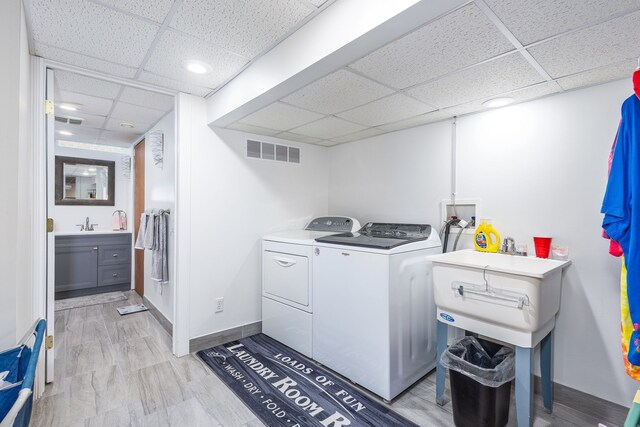 12848 E 14 Mile Rd, Warren, MI 48088 - clothes washing area featuring washer and clothes dryer, baseboards, and recessed lighting