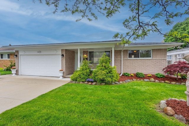 12848 E 14 Mile Rd, Warren, MI 48088 - single story home with brick siding, a front lawn, concrete driveway, and a garage