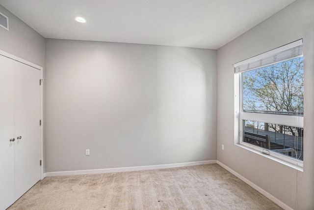 600 Douglas St NW Unit 600C, Grand Rapids, MI 49504 - unfurnished room with light colored carpet, recessed lighting, and baseboards
