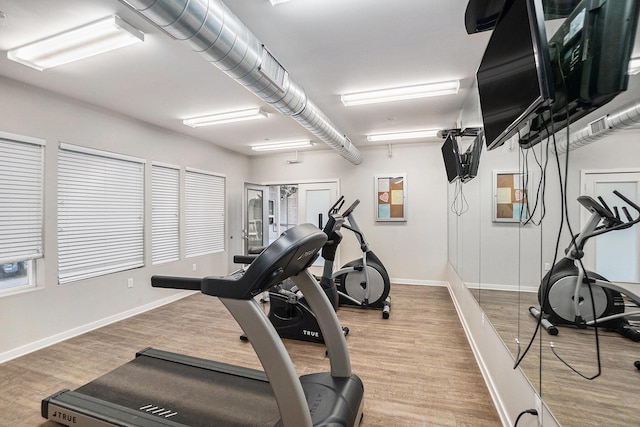600 Douglas St NW Unit 600C, Grand Rapids, MI 49504 - exercise room featuring wood finished floors and baseboards