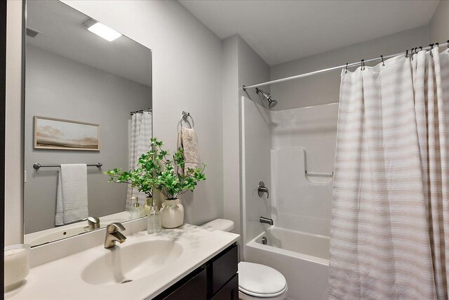 600 Douglas St NW Unit 600C, Grand Rapids, MI 49504 - full bathroom with vanity, shower / tub combo, and toilet