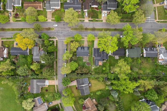 aerial view of property's location with nearby suburban area