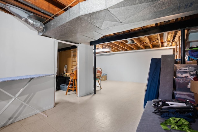 unfinished below grade area featuring tile patterned floors