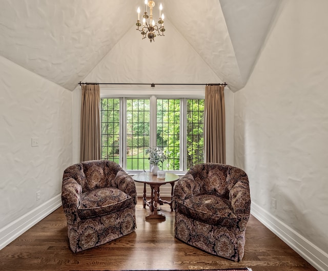 404 Linden Rd, Birmingham, MI 48009 - sitting room with vaulted ceiling, baseboards, a chandelier, and wood finished floors