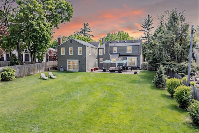 950 W Lincoln St, Birmingham, MI 48009 - rear view of house with a patio and an outdoor hangout area