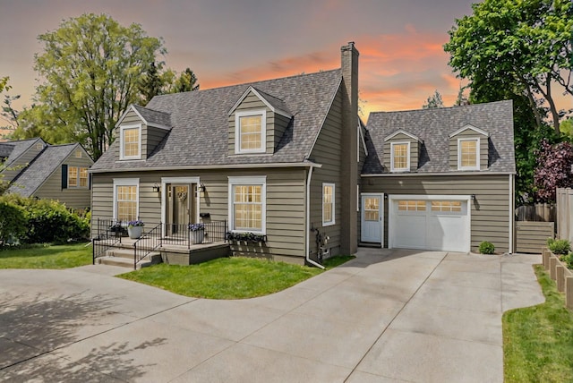 950 W Lincoln St, Birmingham, MI 48009 - cape cod home with concrete driveway, a garage, a shingled roof, and a chimney