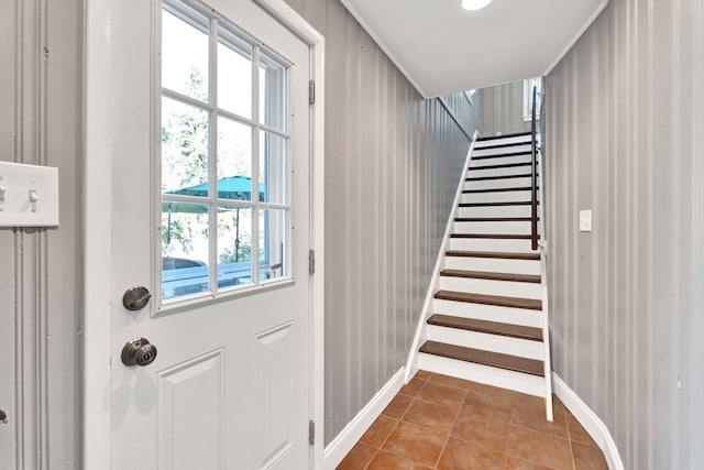 950 W Lincoln St, Birmingham, MI 48009 - doorway with tile patterned floors, plenty of natural light, stairs, and baseboards