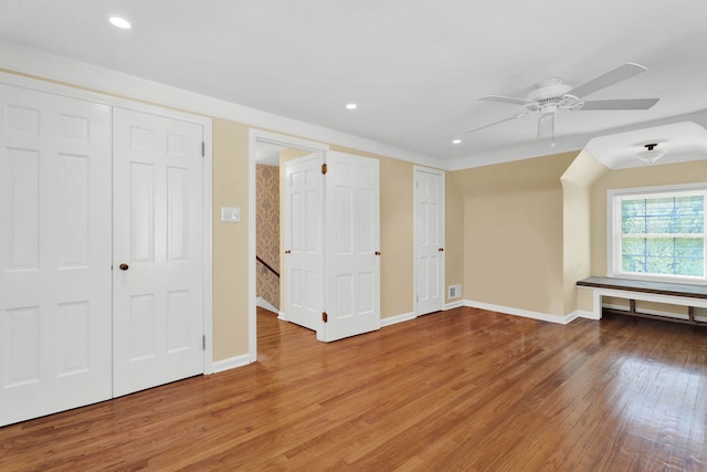 950 W Lincoln St, Birmingham, MI 48009 - unfurnished bedroom with wood finished floors, baseboards, recessed lighting, and ceiling fan