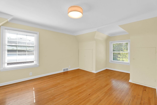 950 W Lincoln St, Birmingham, MI 48009 - empty room with light wood-style floors and baseboards