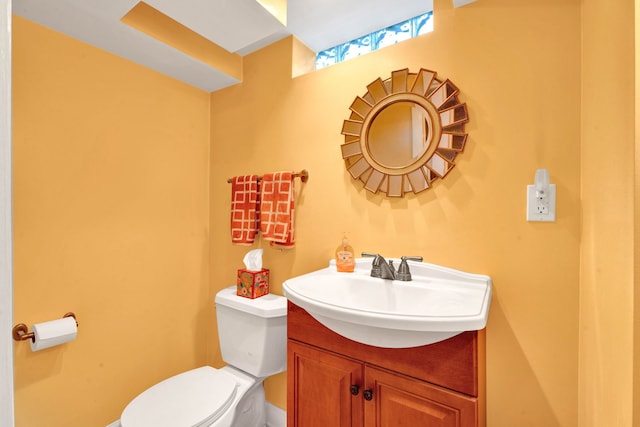 950 W Lincoln St, Birmingham, MI 48009 - half bath with toilet, vanity, and baseboards
