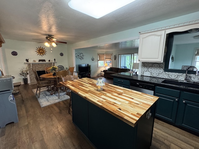 11619 Scott Park Rd, Delton, MI 49046 - kitchen with butcher block countertops, a sink, dishwasher, dark wood finished floors, and a ceiling fan