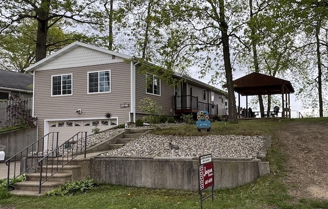 11619 Scott Park Rd, Delton, MI 49046 - back of property featuring a gazebo and a garage