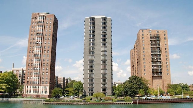 8200 E Jefferson Ave Unit 59/602, Detroit, MI 48214 - view of building exterior featuring a water view and a view of city