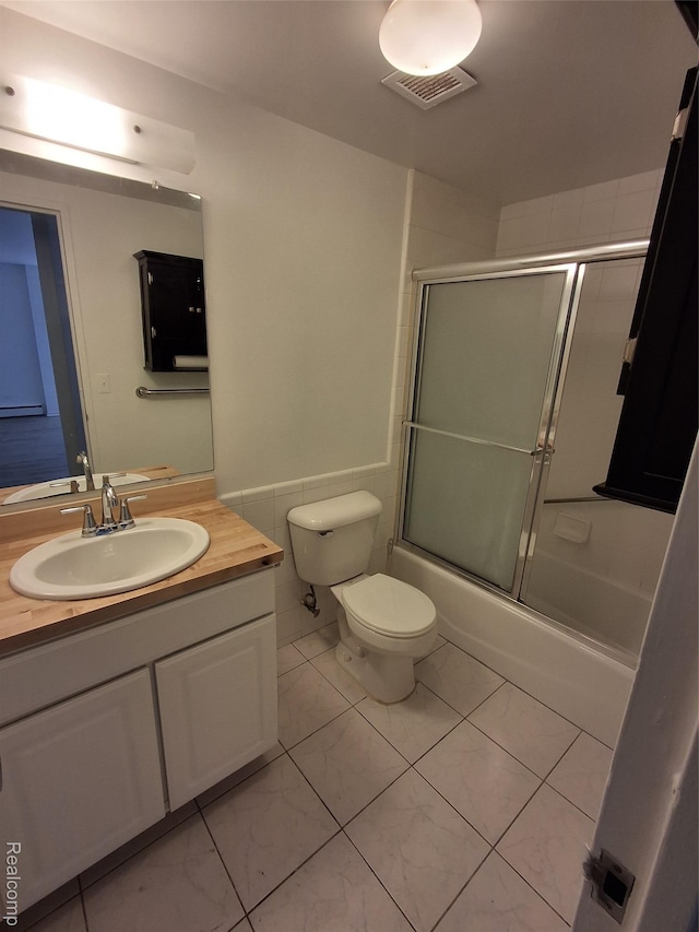 8200 E Jefferson Ave Unit 59/602, Detroit, MI 48214 - full bathroom with vanity, toilet, shower / bath combination with glass door, and marble look tile flooring