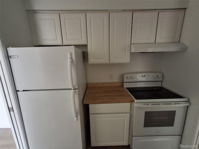 8200 E Jefferson Ave Unit 59/602, Detroit, MI 48214 - kitchen with white appliances, wooden counters, under cabinet range hood, and white cabinetry