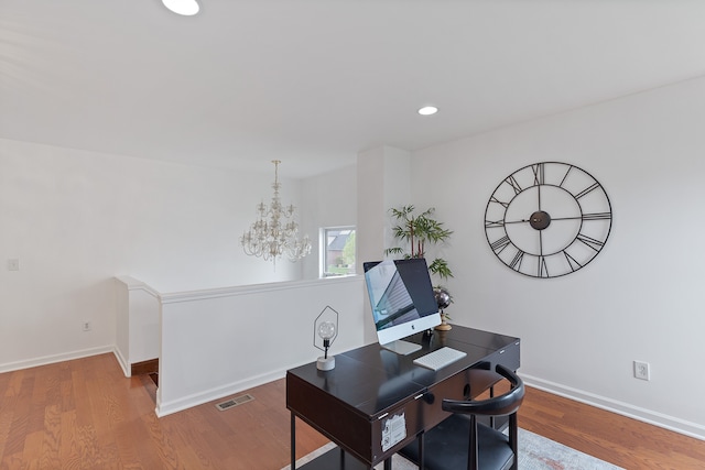14190 Elmhurst Dr, Sterling Heights, MI 48313 - home office with a chandelier, baseboards, wood finished floors, and recessed lighting