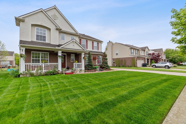 14190 Elmhurst Dr, Sterling Heights, MI 48313 - view of front of property featuring a porch, a front lawn, and brick siding