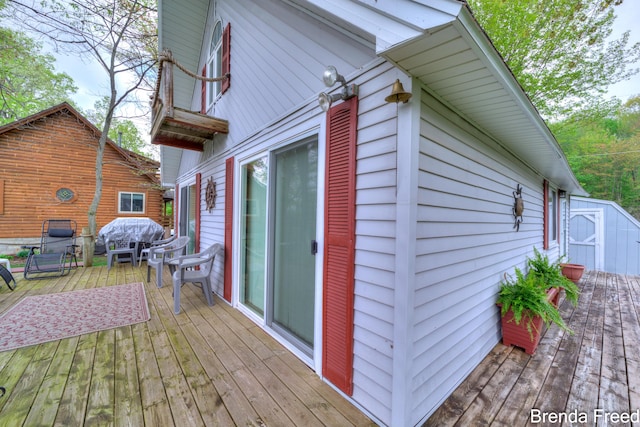 2551 Mayo Dr, Fremont, MI 49412 - wooden terrace featuring a grill